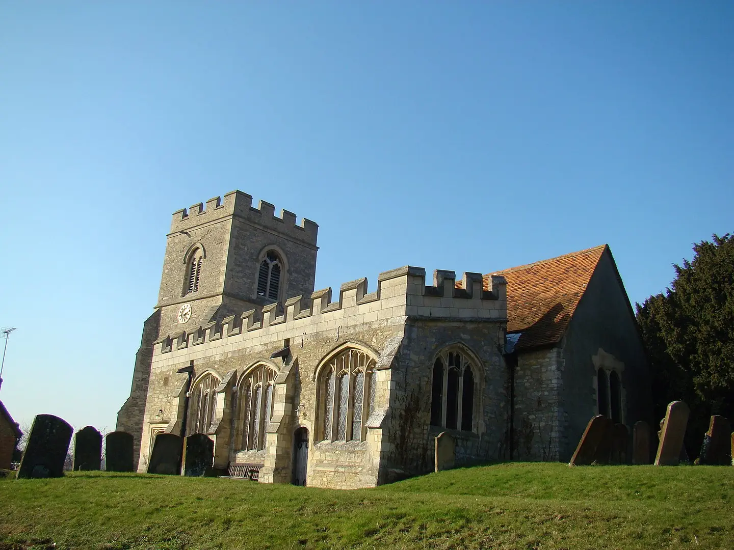 All Saints' Church remains at the centre of a village environment in the Milton Keynes grid square of Loughton.